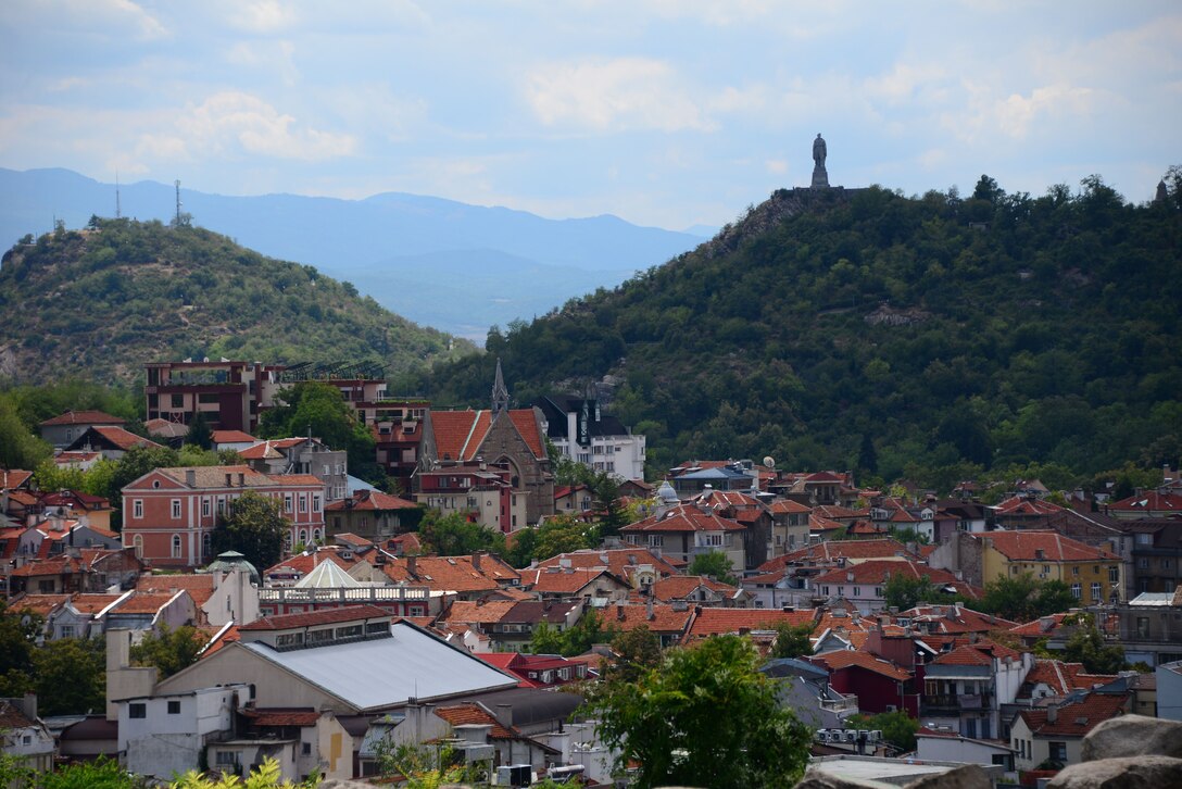 A lone statue of a Russian soldier, a stark remnant of communist reign, stands on one of the highest hills overlooking Plovdiv, Bulgaria.  Tennessee National Guard Soldiers and Airmen enjoyed a Morale Wellness and Recreation visit to Plovdiv on Aug.13, 2016 while they were deployed to Novo Selo Training Area, Bulgaria to participate in Humanitarian Civic Assistance projects.    (U.S. Air National Guard photo by Master Sgt. Kendra M. Owenby, 134 ARW Public Affairs)