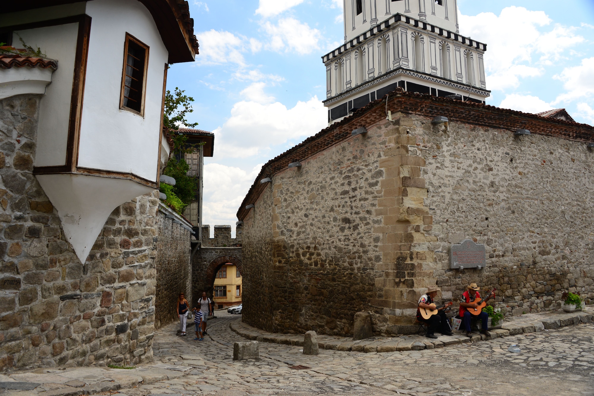 Street musicians play tunes for passerby's on the cobblestone streets of Plovdiv, Bulgaria.  Tennessee National Guard Soldiers and Airmen enjoyed a Morale Wellness and Recreation visit to Plovdiv on Aug.13, 2016 while they were deployed to Novo Selo Training Area, Bulgaria to participate in Humanitarian Civic Assistance projects.    (U.S. Air National Guard photo by Master Sgt. Kendra M. Owenby, 134 ARW Public Affairs)