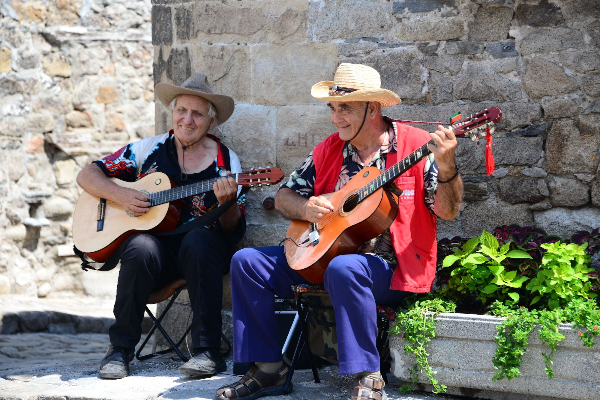 Street musicians perform for passerby's on the cobblestone streets in Nessebar, Bulgaria.  Airmen and Soldiers from the Tennessee National Guard enjoyed touring the area on Aug. 12, 2016 as part of a  Morale Wellness and Recreation event Aug. 12., 2016 while deployed to Novo Selo Training Area, Bulgaria.  Tennessee National Guard Soldiers and Airmen were on rotations as part of Operation Resolute Castle 16, an ongoing operation of military construction to build up Eastern European base infrastructure and help strengthen ties between Tennessee's state partnership with Bulgaria.  (U.S. Air National Guard photo by Master Sgt. Kendra M. Owenby, 134 ARW Public Affairs)