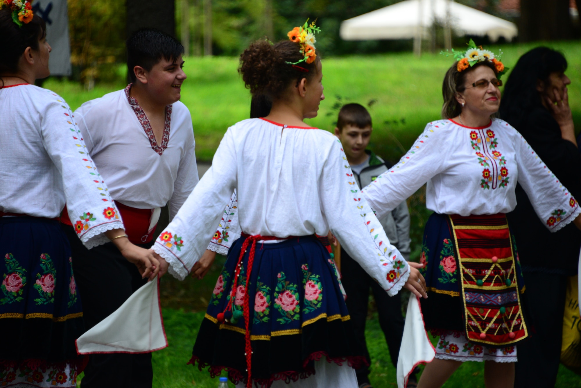 Locals dressed in traditional attire dance in a city park in Plovdiv, Bulgaria.  Tennessee National Guard Soldiers and Airmen enjoyed a Morale Wellness and Recreation visit to Plovdiv on Aug.13, 2016 while they were deployed to Novo Selo Training Area, Bulgaria to participate in Humanitarian Civic Assistance projects.    (U.S. Air National Guard photo by Master Sgt. Kendra M. Owenby, 134 ARW Public Affairs)