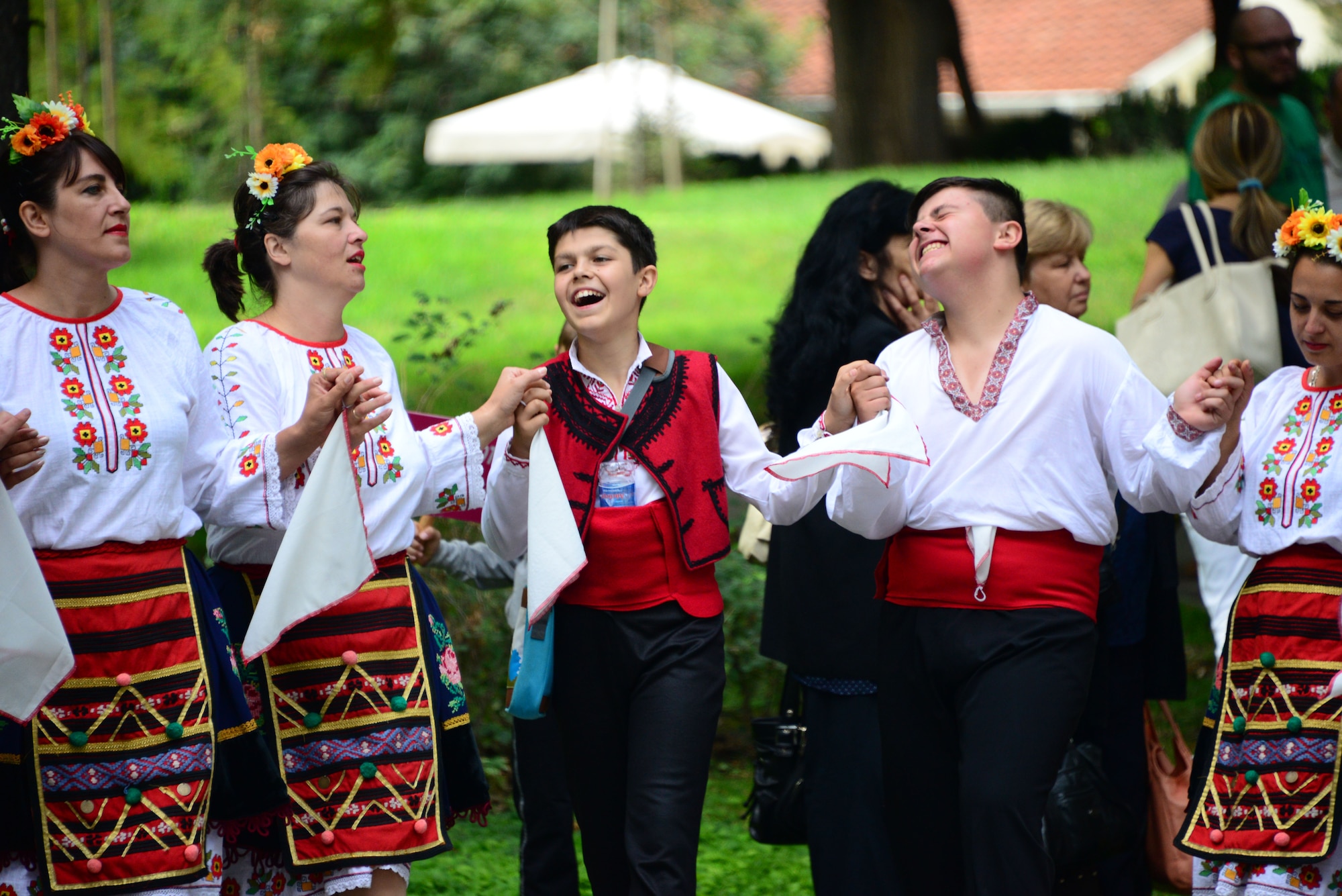 Locals dressed in traditional attire dance and sing in a city park in Plovdiv, Bulgaria.  Tennessee National Guard Soldiers and Airmen enjoyed a Morale Wellness and Recreation visit to Plovdiv on Aug.13, 2016 while they were deployed to Novo Selo Training Area, Bulgaria to participate in Humanitarian Civic Assistance projects.    (U.S. Air National Guard photo by Master Sgt. Kendra M. Owenby, 134 ARW Public Affairs)