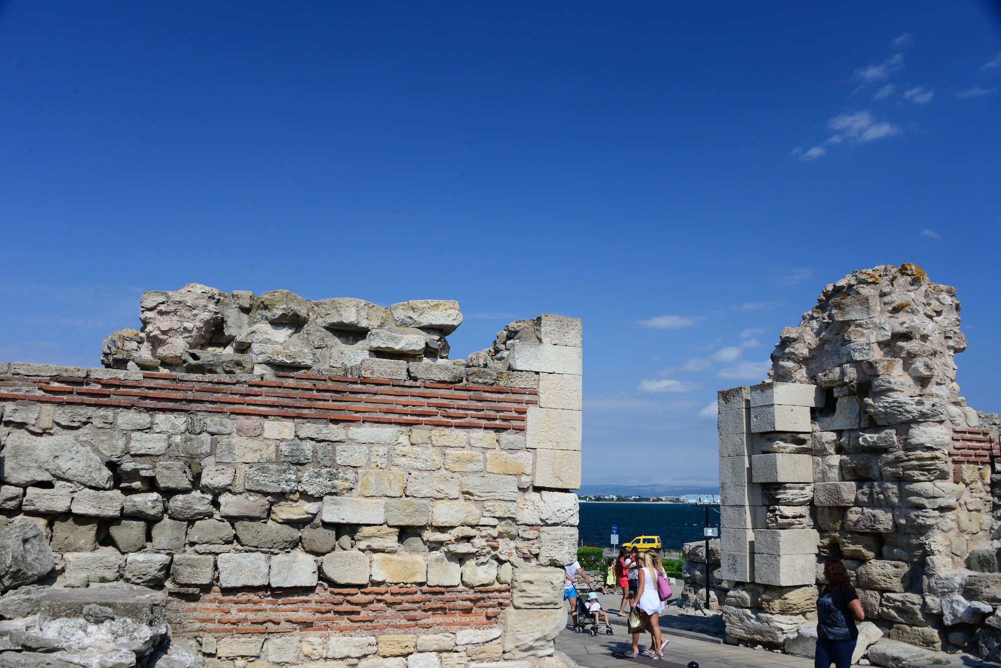 Visitors tour the old city ruins of Nessebar, Bulgaria, an ancient settlement along the Black Sea.  Airmen and Soldiers toured the area as part of a  Morale Wellness and Recreation event Aug. 12., 2016 while deployed to Novo Selo Training Area, Bulgaria.  Tennessee National Guard Soldiers and Airmen were on rotations as part of Operation Resolute Castle 16, an ongoing operation of military construction to build up Eastern European base infrastructure and help strengthen ties between Tennessee's state partnership with Bulgaria.  (U.S. Air National Guard photo by Master Sgt. Kendra M. Owenby, 134 ARW Public Affairs)