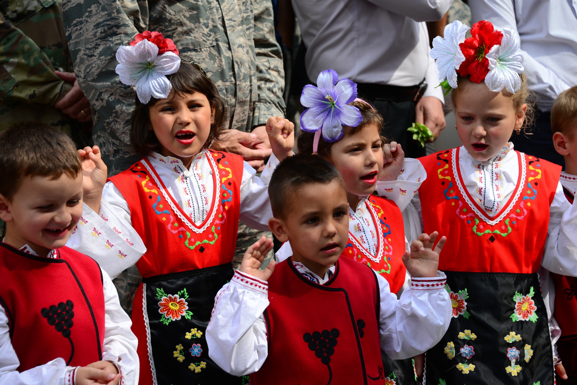 Students sing traditional songs at the grand re-opening of the Izvorche Kindergarten school in Kabile, Bulgaria, Aug. 24, 2016.  Tennessee National Guard Soldiers and Airmen from the 164th Civil Engineer Squadron, 118th Mission Support Group, 134th Air Refueling Wing, and the 194th Engineer Brigade deployed to nearby Novo Selo Training Area for thier annual training to participate in Humanitarian Civic Assistance projects such as the renovation of the school.  The projects build skills for the Airmen while helping to strengthen ties with Tennessee and Bulgaria through the State Partnership Program.  (U.S. Air National Guard photo by Master Sgt. Kendra M. Owenby, 134 ARW Public Affairs)