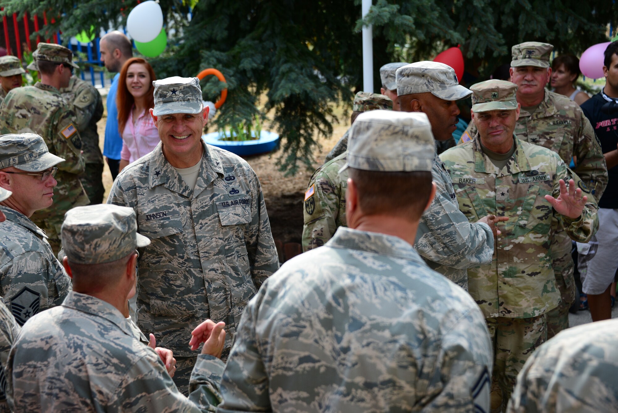 Brig. Gen. Donald Johnson, Assistant Adjutant Gen. (Air), Tennessee, greets Tennessee National Guard members at the grand re-opening of the Izvorche Kindergarten school in Kabile, Bulgaria, Aug. 24, 2016.  Tennessee National Guard Soldiers and Airmen from the 164th Civil Engineer Squadron, 118th Mission Support Group, 134th Air Refueling Wing, and the 194th Engineer Brigade deployed to nearby Novo Selo Training Area for thier annual training to participate in Humanitarian Civic Assistance projects such as the renovation of the school.  The projects build skills for the Airmen while helping to strengthen ties with Tennessee and Bulgaria through the State Partnership Program.  (U.S. Air National Guard photo by Master Sgt. Kendra M. Owenby, 134 ARW Public Affairs)