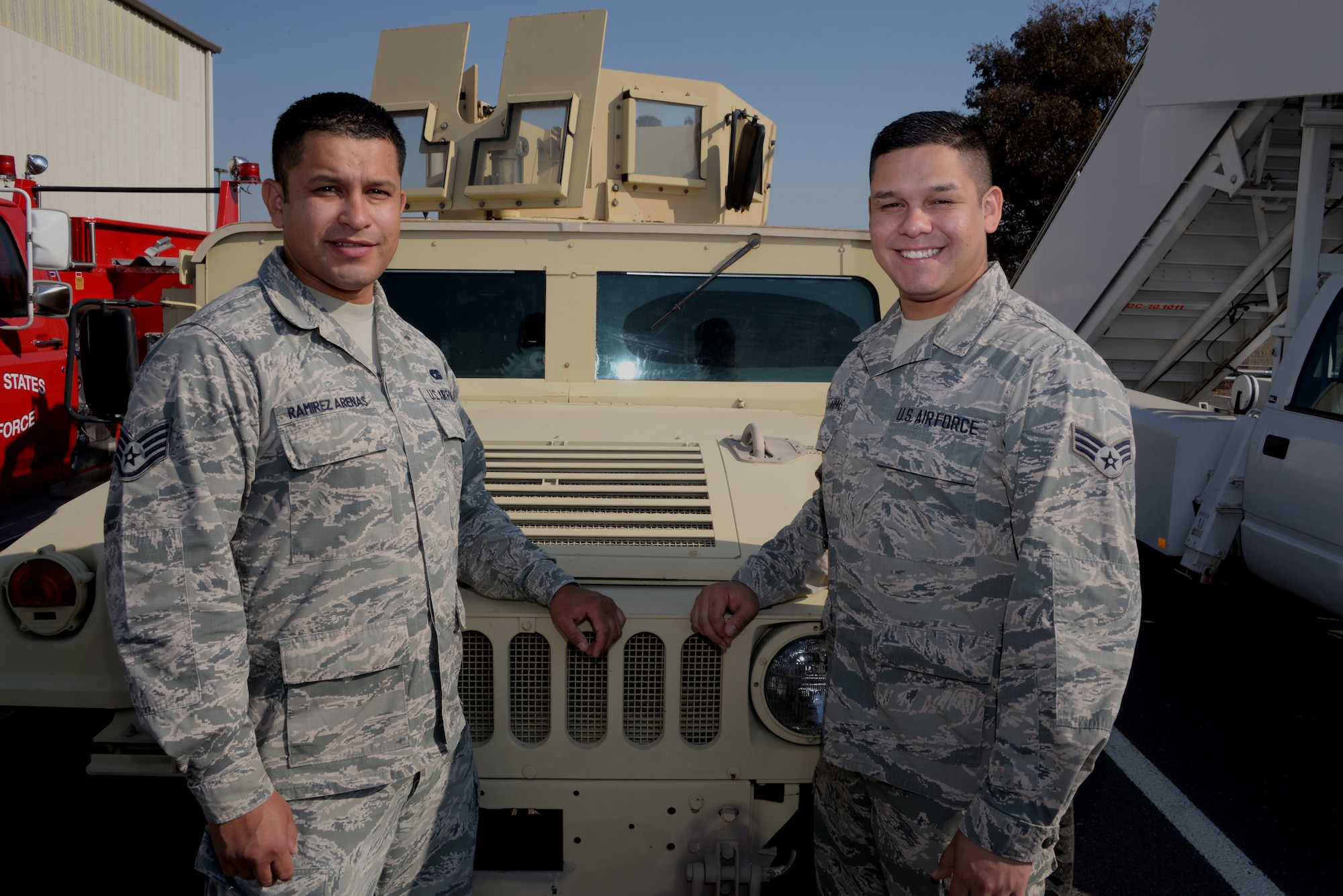 Staff Sgt. Angel Ramirez Arenas (Left), 60th Logistical Readiness Squadron NCO in charge of fleet management, poses for a photo with his brother, Senior Airman Ramon Ramirez Arenas (Right), 60th Surgical Operations Squadron surgical technician, at Travis Air Force Base, Calif., Sept. 7, 2016. The brothers from Compton, Calif., have been assigned to TAFB for almost two years and have nearly a decade of military service between them. (U.S. Air Force photo by Tech. Sgt. James Hodgman)