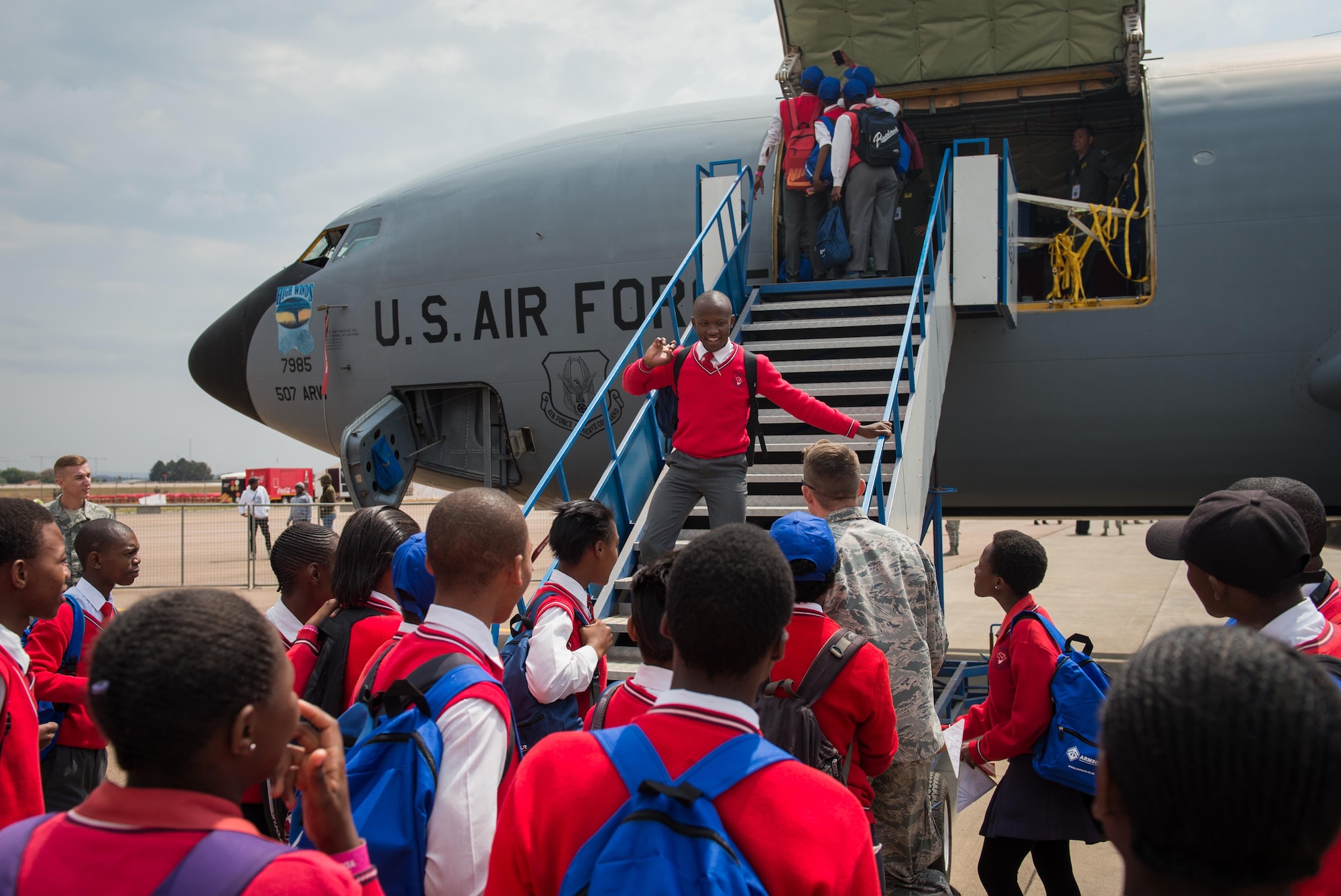 South African students tour a U.S. KC-135 Stratotanker at the African Aerospace and Defense Expo at Waterkloof Air Force Base, South Africa, Sept. 14, 2016. The U.S. military is exhibiting a C-17 Globemaster III, a KC-135 Stratotanker, a C-130J Super Hercules, an HC-130 King, and an MQ-9 Reaper. The aircraft come from various Air National Guard and Air Force Reserve Command units. The U.S. routinely participates in events like AADE to strengthen partnerships with regional partners. (U.S. Air Force photo by Tech. Sgt. Ryan Crane)