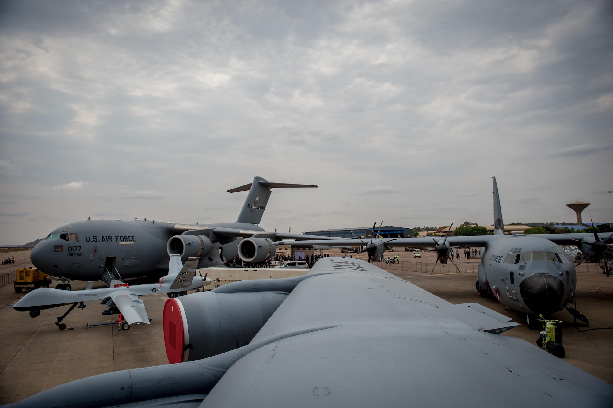 U.S. military aircraft are displayed at the African Aerospace and Defense Expo at Waterkloof Air Force Base, South Africa, Sept. 14, 2016. The U.S. military is exhibiting a C-17 Globemaster III, a KC-135 Stratotanker, a C-130J Super Hercules, an HC-130 King, and an MQ-9 Reaper. The aircraft come from various Air National Guard and Air Force Reserve Command units. The U.S. routinely participates in events like AADE to strengthen partnerships with regional partners. (U.S. Air Force photo by Tech. Sgt. Ryan Crane)