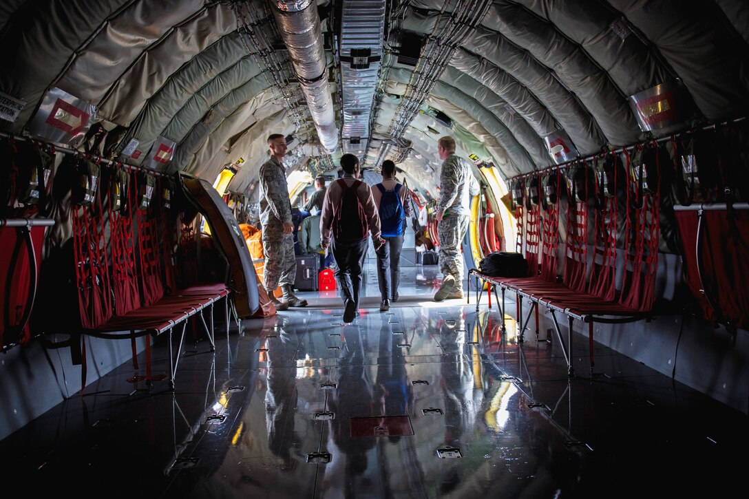 U.S. guardsmen give South African students a tour of a KC-135 Stratotanker during the African Aerospace and Defense Expo at Waterkloof Air Force Base in South Africa, Sept. 14, 2016. The U.S. military is also exhibiting a C-17 Globemaster III, a C-130J Super Hercules, an HC-130 King and an MQ-9 Reaper. Air Force photo by Tech. Sgt. Ryan Crane