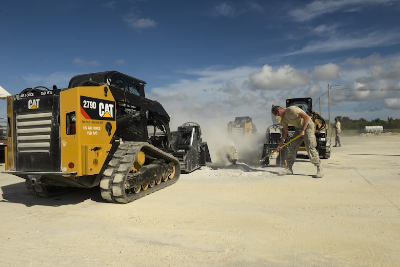 A joint team of U.S. Air Force Airmen from the Kadena, Yakota and Misawa civil engineer squadrons cut through the concrete on the simulated flightline during rapid airfield damage repair training Sept, 15, 2016, at Kadena Air Base, Japan. The Air Force Civil Engineer Center at Tyndall Air Force Base, Fla., selected Kadena as a test base for the RADR program because of its key location in the Pacific theater. (U.S. Air Force photo by Senior Airman Stephen G. Eigel)