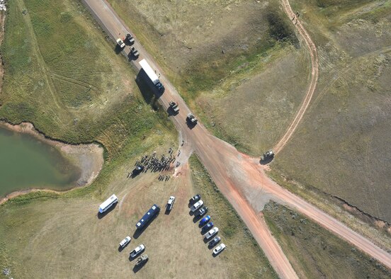 Airmen from Malmstrom Air Force Base along with local, state and federal law enforcement train together in a Local Integrated Response Plan exercise Sept. 14, 2016, near Stanford, Mont.  The LIRP is a generalized plan that coordinates the response capabilities of the Air Force, FBI and civilian law enforcement departments within the state if a nuclear asset were ever threatened or compromised.  (U.S. Air Force photo/Jason Heavner)
