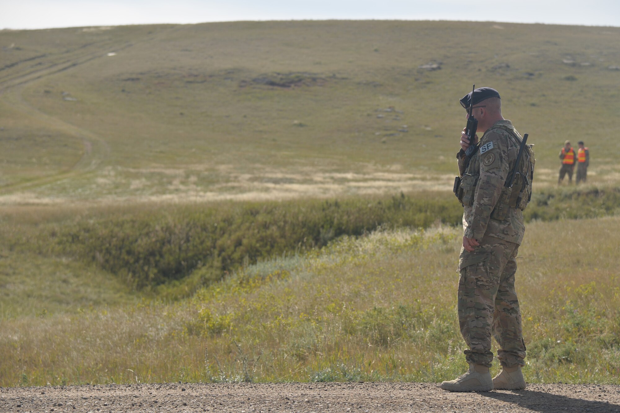 Master Sgt. Jason Shores, 741st Missile Security Forces Squadron Convoy Response Force section chief, communicates with team members during a Local Integrated Response Plan exercise Sept. 14, 2016, near Stanford, Mont.  The LIRP is a generalized plan that coordinates the response capabilities of the Air Force, FBI and civilian law enforcement departments within the state if a nuclear asset were ever threatened or compromised.  (U.S. Air Force photo/Airman First Class Daniel Brosam)

