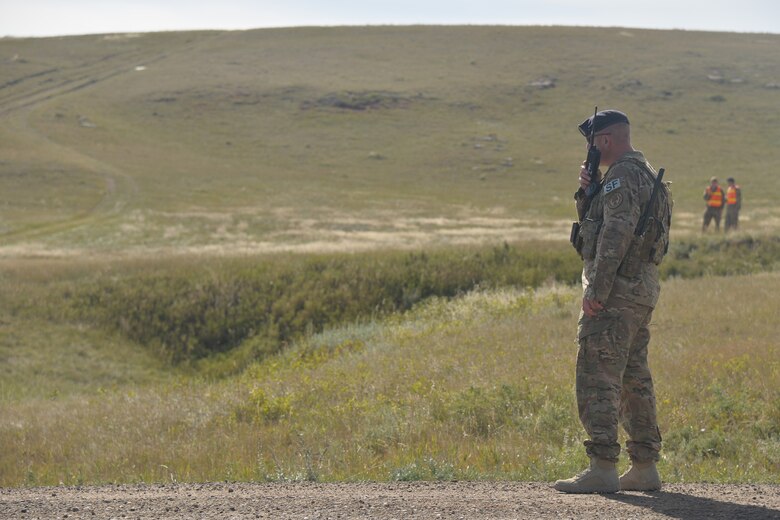 Master Sgt. Jason Shores, 741st Missile Security Forces Squadron Convoy Response Force section chief, communicates with team members during a Local Integrated Response Plan exercise Sept. 14, 2016, near Stanford, Mont.  The LIRP is a generalized plan that coordinates the response capabilities of the Air Force, FBI and civilian law enforcement departments within the state if a nuclear asset were ever threatened or compromised.  (U.S. Air Force photo/Airman First Class Daniel Brosam)

