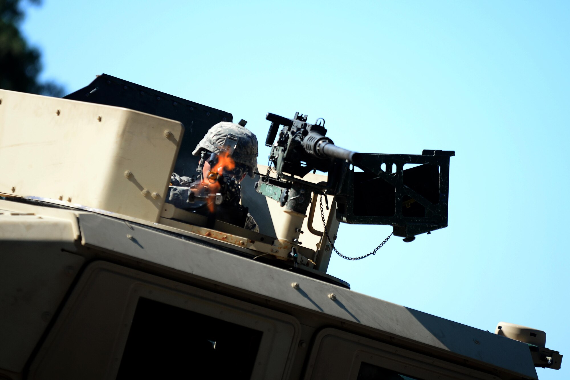 A Soldier assigned to the 23rd Military Police Company fires his weapon from atop a Humvee at Joint Base McGuire-Dix-Lakehurst, N.J., on Sept. 13, 2016. The 23rd Military Police Company convoyed more than 300 miles from Ft. Drum, N.Y. to JB MDL to conduct combat training. 