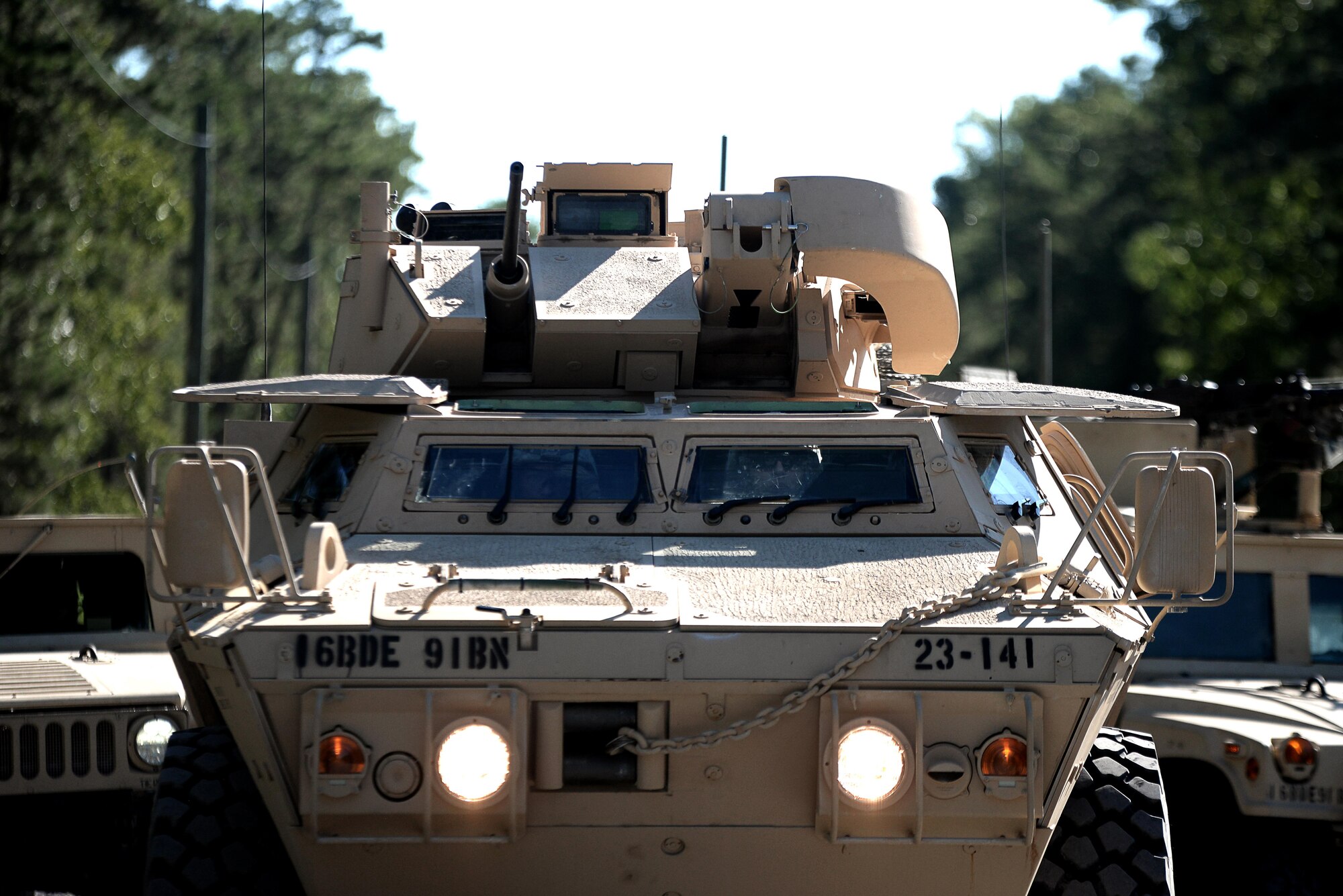Military vehicles from the 23rd Military Police Company, Ft. Drum, N.Y., form up on Range Road at Joint Base McGuire-Dix-Lakehurst, N.J., to conduct a convey attack scenario Sept. 16, 2016. Soldiers from the 23rd Military Police Company convoyed to JB MDL to conduct combat training from Sept. 6 to Sept. 16. 