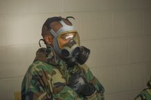 4th WOT Trainee demonstrates proper function of the personal protective mask in the mask confidence chamber.