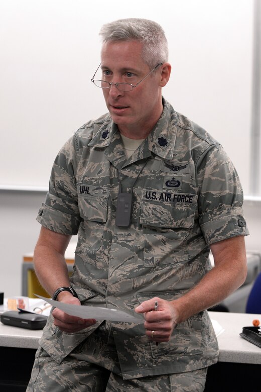 Lt. Col. Bill Uhl, an assistant professor and deputy head of the Philosophy Department at the U.S. Air Force Academy, speaks to cadets in a classroom, Sept. 8, 2016. Uhl suffers from hearing loss but says his qualify of life has greatly improved by the use of hearing aids and assisstive listening technology, which he wears while teaching cadets. (U.S. Air Force photo/Darcie Ibidapo)