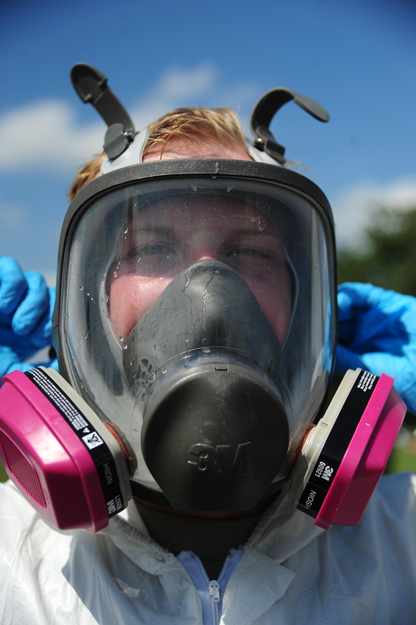 A low observable technician from the 509th Maintenance Squadron tightens the straps on his respirator mask prior to painting an FB-111A General Dynamics Aardvark static display at Whiteman Air Force Base, Mo., Sept. 13, 2016. In addition to aircraft painting and other normal duties, low observable technicians perform cosmetic maintenance on static displays at Whiteman. (U.S. Air Force photo by Senior Airman Joel Pfiester)