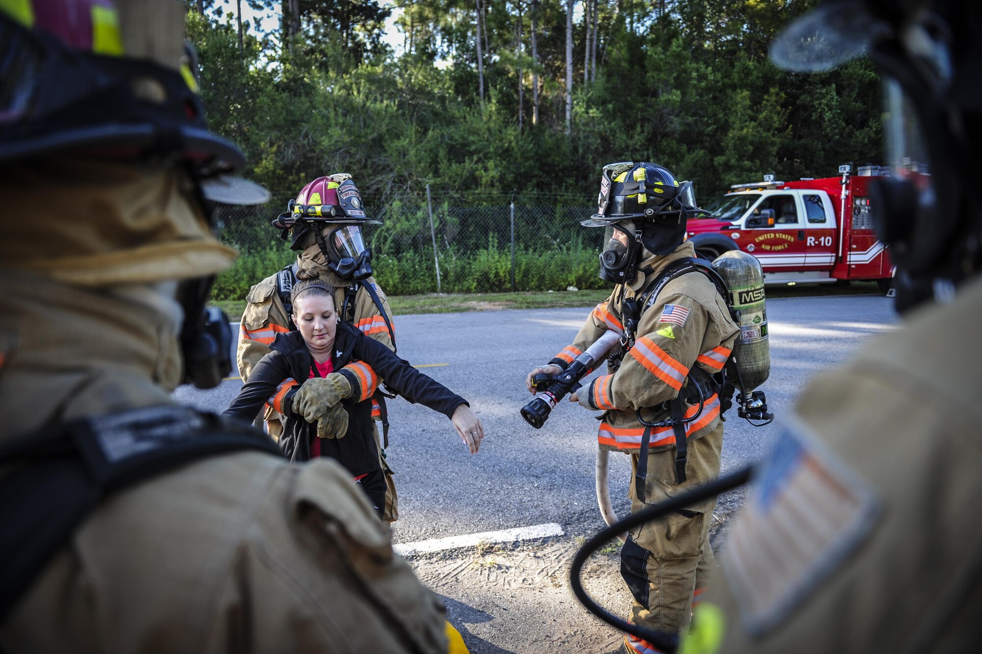 Firefighters with the 1st Special Operations Civil Engineering Squadron care for simulated victims during an exercise at Hurlburt Field, Fla., Sept. 15, 2016. Air Commandos participated in a three-day exercise to hone real-world emergency response capabilities. (U.S Air Force photo by Airman 1st Class Joseph Pick)