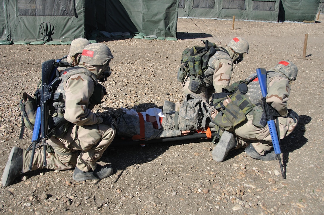 6th WOT A simulated casualty receives first aid and is transported to a medical facility during a BEAST exercise.