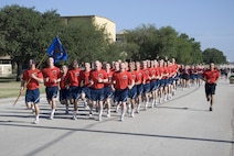 8th WOT Trainees participate in a motivational Airman's Run during graduation week activities.