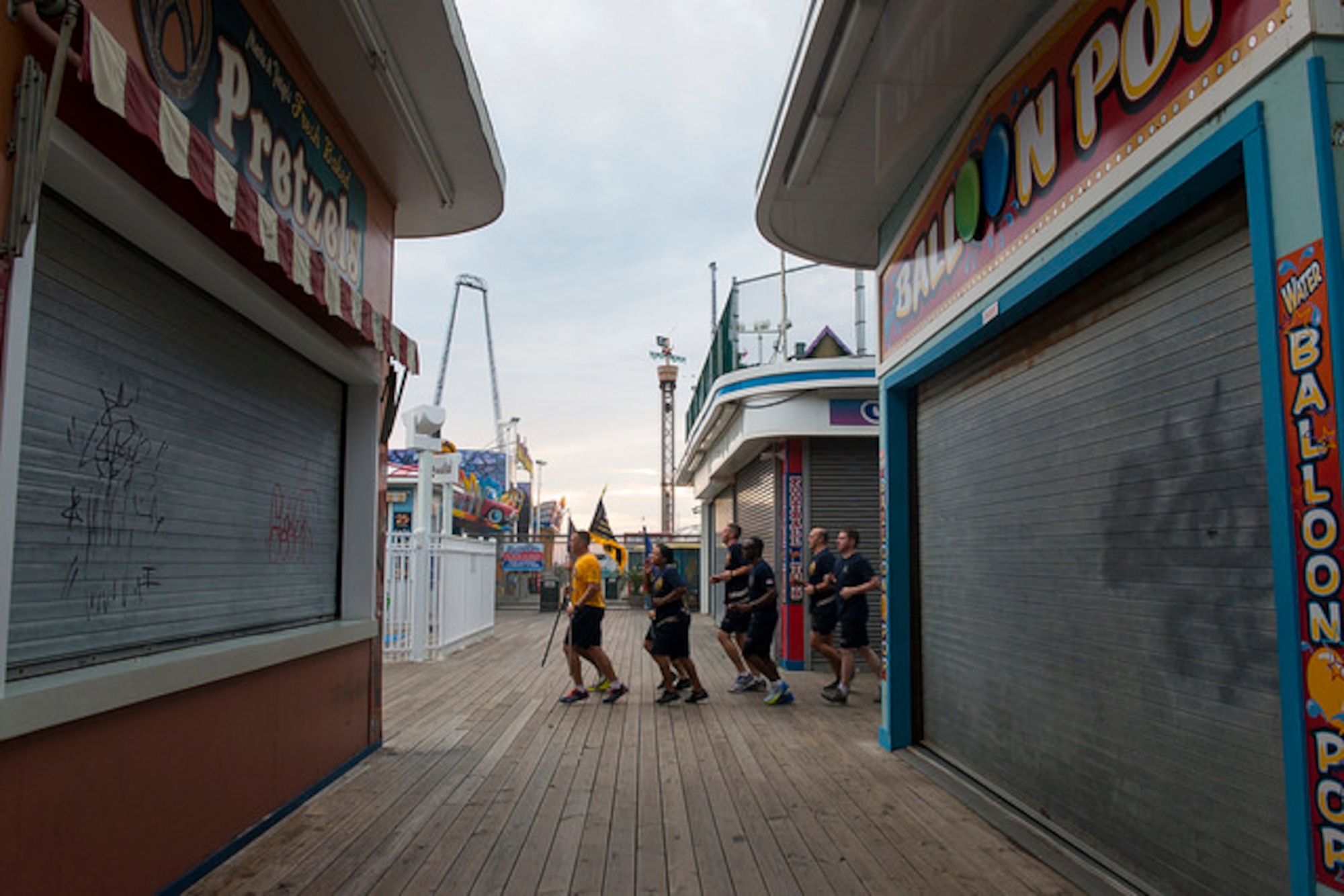 Navy Cheif Petty Officers from Joint Base McGuire-Dix-Lakehurst run through the boardwalk in Seaside Park, N.J. Spet. 9. The Run was 9.11 miles in remembrance of 9/11, the group of chiefs complete this run every year.