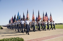 8th WOT Graduation events conclude with Parade. Airmen carry all 50 US state flags each week at parade.