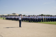 8th WOT The administration of the Oath of Enlistment officially indoctrinates the newest Air Force Enlisted members at the Parade Ceremony.