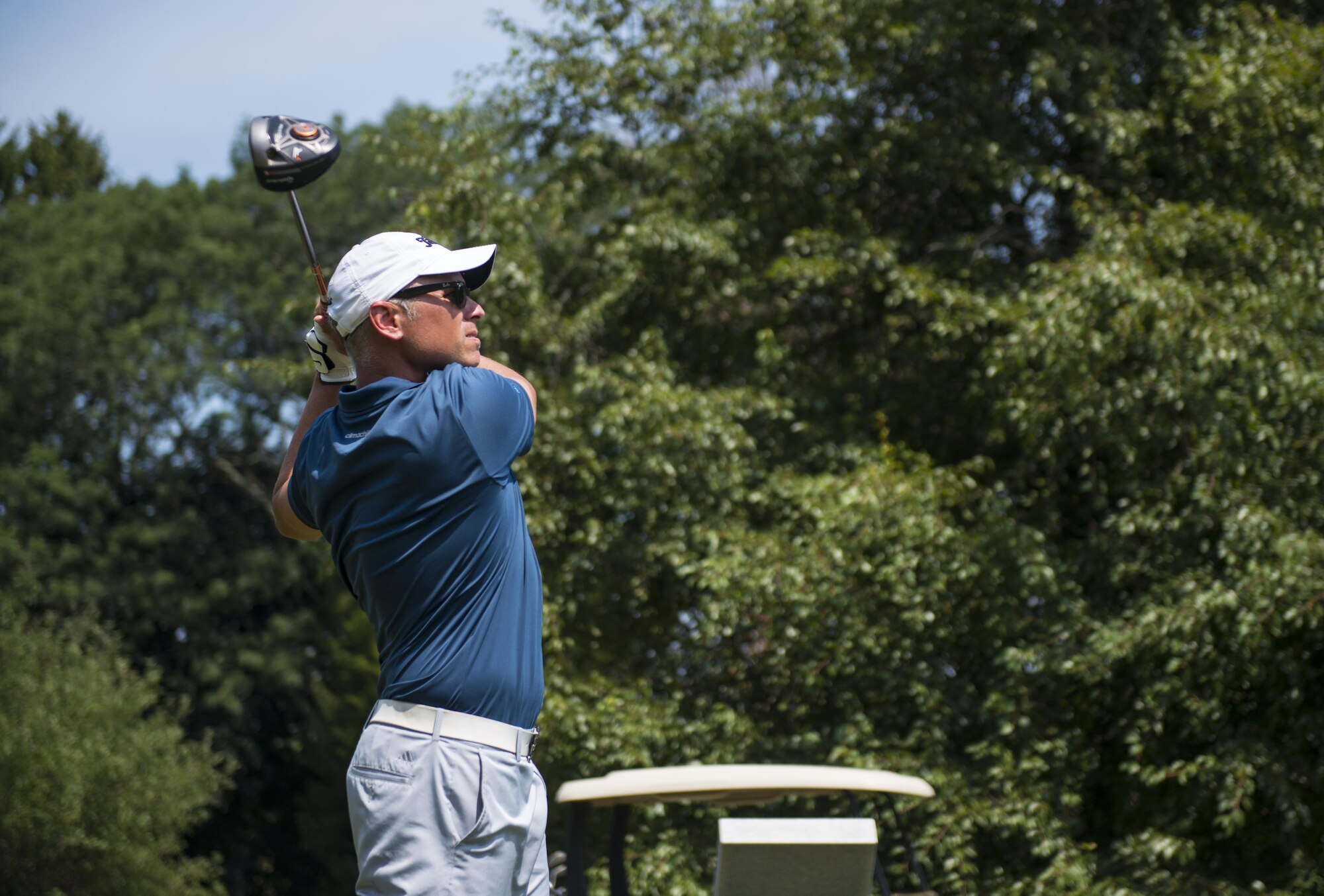 Senior Master Sgt. Jason Perry, Precision Measurement Equipment Laboratory superintendent, finishes his swing during a round of golf at Joint Base McGuire-Dix-Lakehurst, N.J. Perry made the Air Force golf team for the seventh time tis year.