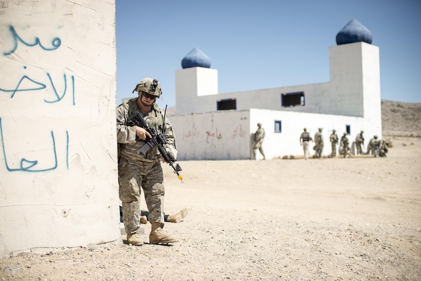 Sgt. 1st Class James Mays, a civil affairs Soldier from Red Boiling Springs, Tenn., pulls security while troops from the 437th Civil Affairs Battalion hone their civil affairs capabilities at National Training Center Fort Irwin, Calif., Sept. 7, 2016. The 437th Civil Affairs Bn. keeps troops trained and proficient in order to support the s 352nd Civil Affairs Command’s mission to support the Central Command area of operations. (U.S. Army photo by Master Sgt. Mark Burrell, 352nd CACOM)