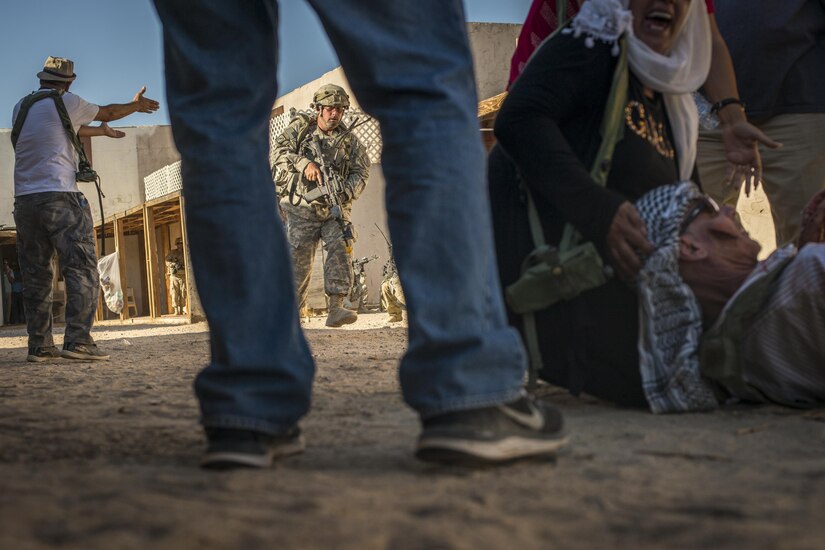 Staff Sgt. Patrick Horan, a civil affairs Soldier from Sneads Ferry, N.C., assigned to the 437th Civil Affairs Battalion, runs to help a role player simulating an injury during training at National Training Center Fort Irwin, Calif., Sept. 7, 2016. The 437th Civil Affairs Bn. keeps troops trained and proficient in order to support the s 352nd Civil Affairs Command’s mission to support the Central Command area of operations. (U.S. Army photo by Master Sgt. Mark Burrell, 352nd CACOM)