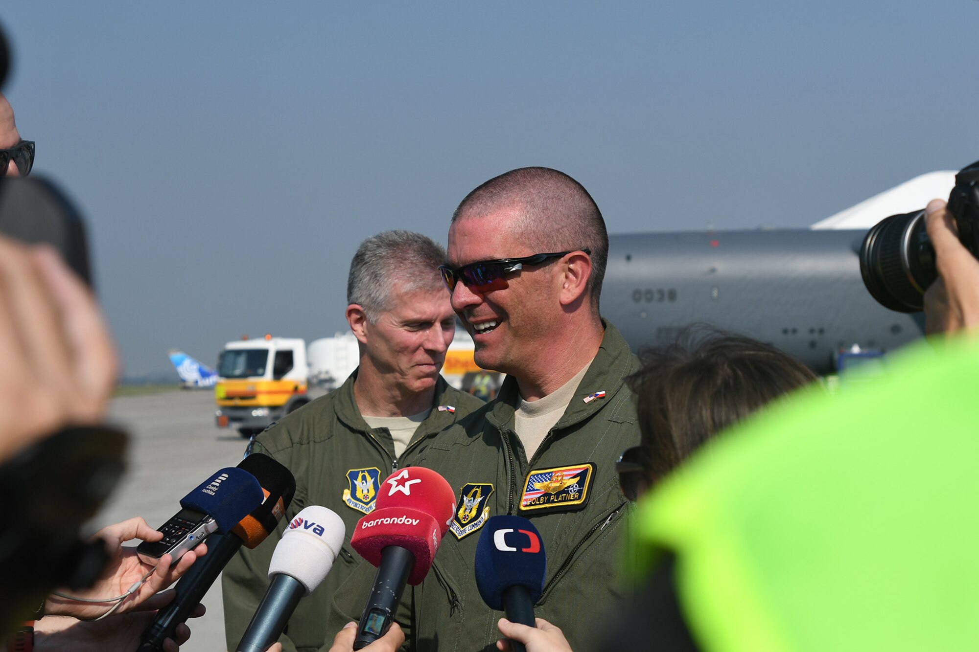 U.S. Air Force Maj. Colby Platner, 307th Bomb Wing B-52 Stratofortress crewmember, answers questions from the media at the Leos Janacek Airport, Ostrava in the Czech Republic on Sept. 13, 2016. A B-52 from the 307th BW and a B-1 Lancer from the 7th Bomb Wing landed at the airport for the 2016 NATO Days Air Show being held Sept. 17-18. (U.S. Air Force photo by Master Sgt. Dachelle Melville/Released)
