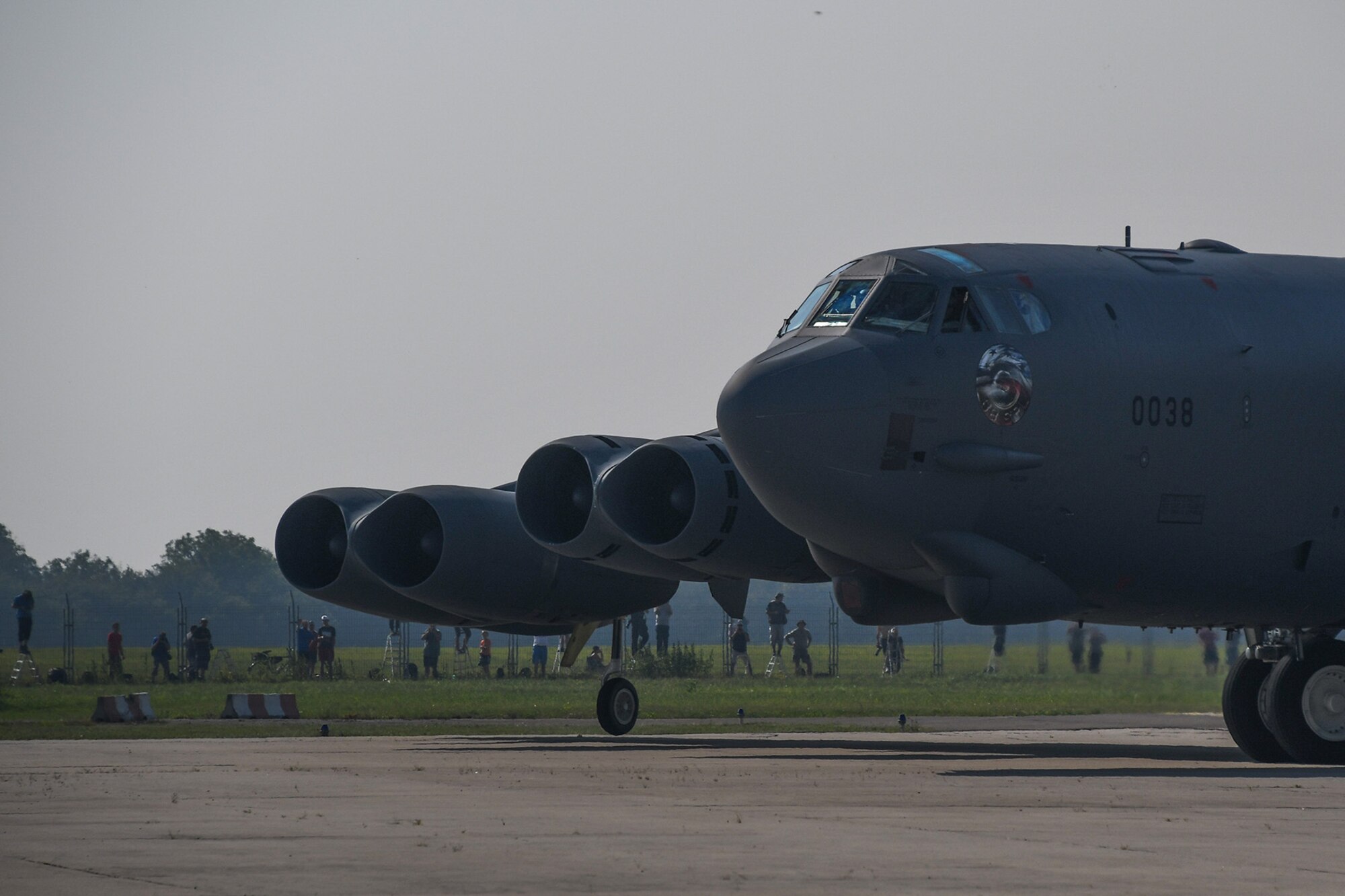 A B-52 Stratofortress from the 307th Bomb Wing taxis to the parking apron at the Leos Janacek Airport, Ostrava in the Czech Republic on Sept. 13, 2016. Spectators lines the airport fences to see the B-52 and B-1 Lancer from the 7th Bomb Wing arrive for the 2016 NATO Days Air Show being held Sept. 17-18. (U.S. Air Force photo by Master Sgt. Dachelle Melville/Released)