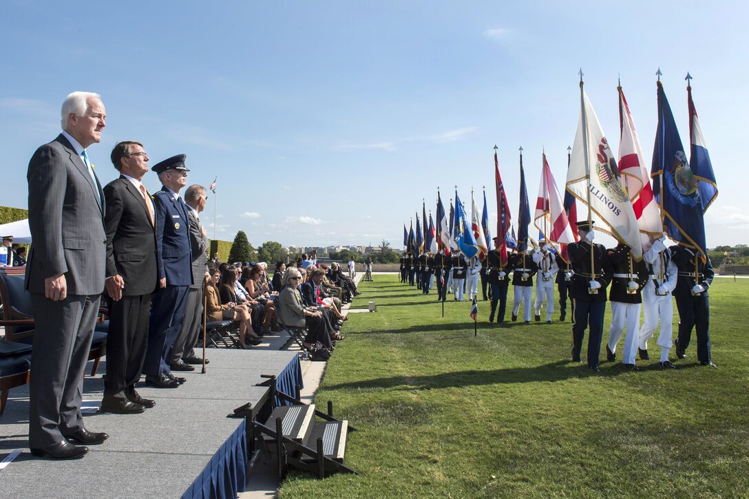 Defense Secretary Ash Carter, center left, and Air Force Gen. Paul J. Selva, center right, vice chairman of the Joint Chiefs of Staff, observe honor guard members during a POW/MIA ceremony at the Pentagon, Sept. 16, 2016. National POW/MIA Recognition Day is observed on the third Friday in September and honors those who were prisoners of war and those who are still missing in action. DoD photo by Air Force Tech. Sgt. Brigitte N. Brantley