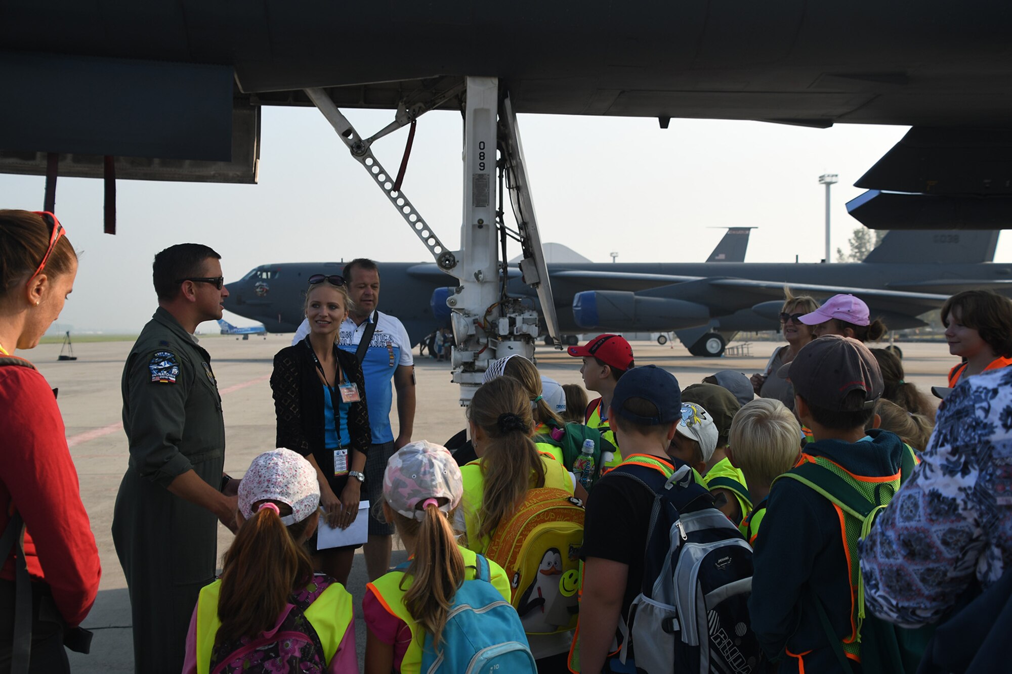 U.S. Air Force Lt. Col. Jimmy Jackson, a B-1 Lancer crewmember assigned to the reserve 345th Bomb Squadron, Dyess Air Force Base, Texas, answers questions about the bomber during a tour at the Leos Janacek Airport, Ostrava in the Czech Republic on Sept. 14, 2016. Three classes from a local elementary school received a special tour of the B-1 and a B-52 Stratofortress from the 307th Bomb Wing, Barksdale AFB, La. Both bombers flew into Ostrava for the 2016 NATO Days Air Show after participating in Exercise Ample Strike 16, a Czech Republic led multi-nation live exercise. (U.S. Air Force photo by Master Sgt. Dachelle Melville/Released)