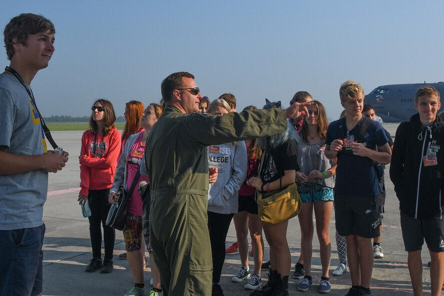 U.S. Air Force Capt. Jason Violette, a B-1 Lancer crewmember assigned to the 345th Bomb Squadron, Dyess Air Force Base, Texas, points out features of the B-1 Lancer during a tour at the Leos Janacek Airport, Ostrava in the Czech Republic on Sept. 14, 2016. Three classes from a local elementary school received a special tour of the B-1 and a B-52 Stratofortress from the 307th Bomb Wing, Barksdale AFB, La. Both bombers flew into Ostrava for the 2016 NATO Days Air Show after participating in Exercise Ample Strike 16, a Czech Republic led multi-nation live exercise. (U.S. Air Force photo by Master Sgt. Dachelle Melville/Released)