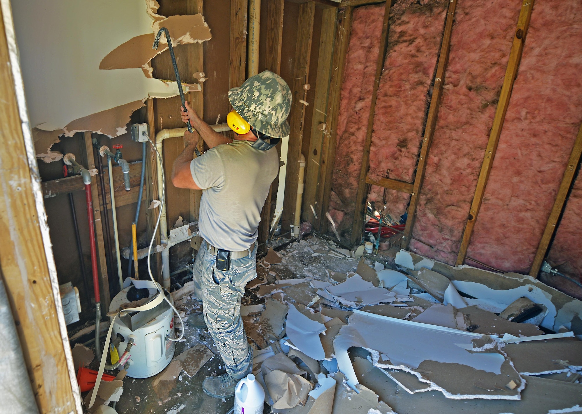 Tech. Sgt. Rickey Schaefer, a structural journeyman with the 556th RED HORSE, demolishes the interior of the softball field press box at Hurlburt Field Fla., Sept. 13, 2016. Inside the press box, the interior walls will be renovated, and the pluming and restroom partitions will be replaced. (U.S. Air Force photo by Senior Airman Andrea Posey)