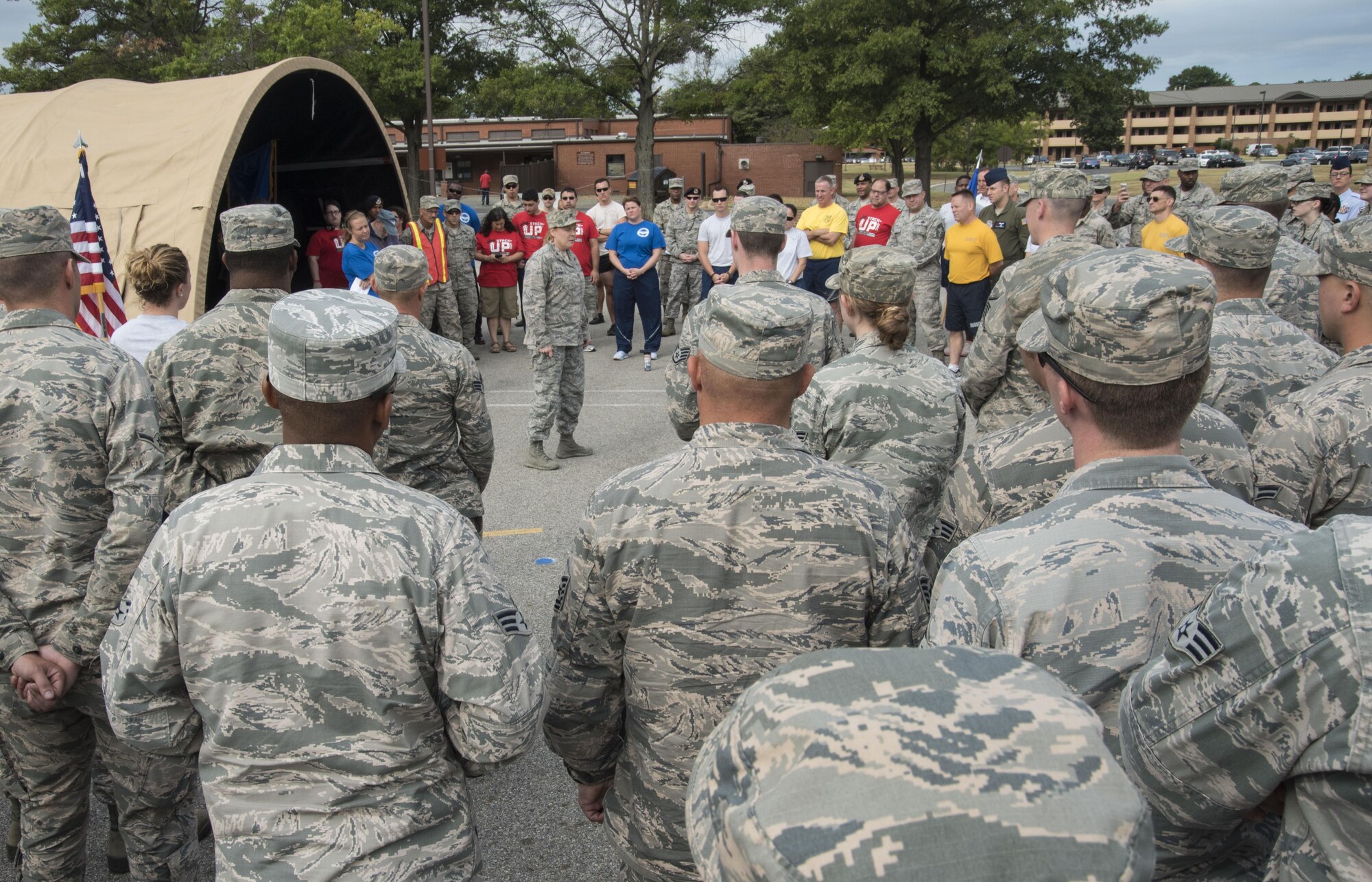 Col. Sharon Bannister,  79th Medical Wing commander, speaks to a group of Airmen and Sailors during the POW/MIA opening ceremony at Joint Base Andrews, Md., Sept. 15, 2016. Bannister told the story of her father, a military member who was labeled missing in action in March 1972 during the Vietnam War. She described the feeling of uncertainty trailing the disappearance of her father and shared the sense of closure she felt almost 35 years later when an excavation team found his remains. (U.S. Air Force photo by Senior Airman Jordyn Fetter)