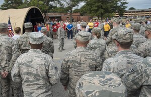 Col. Sharon Bannister,  79th Medical Wing commander, speaks to a group of Airmen and Sailors during the POW/MIA opening ceremony at Joint Base Andrews, Md., Sept. 15, 2016. Bannister told the story of her father, a military member who was labeled missing in action in March 1972 during the Vietnam War. She described the feeling of uncertainty trailing the disappearance of her father and shared the sense of closure she felt almost 35 years later when an excavation team found his remains. (U.S. Air Force photo by Senior Airman Jordyn Fetter)