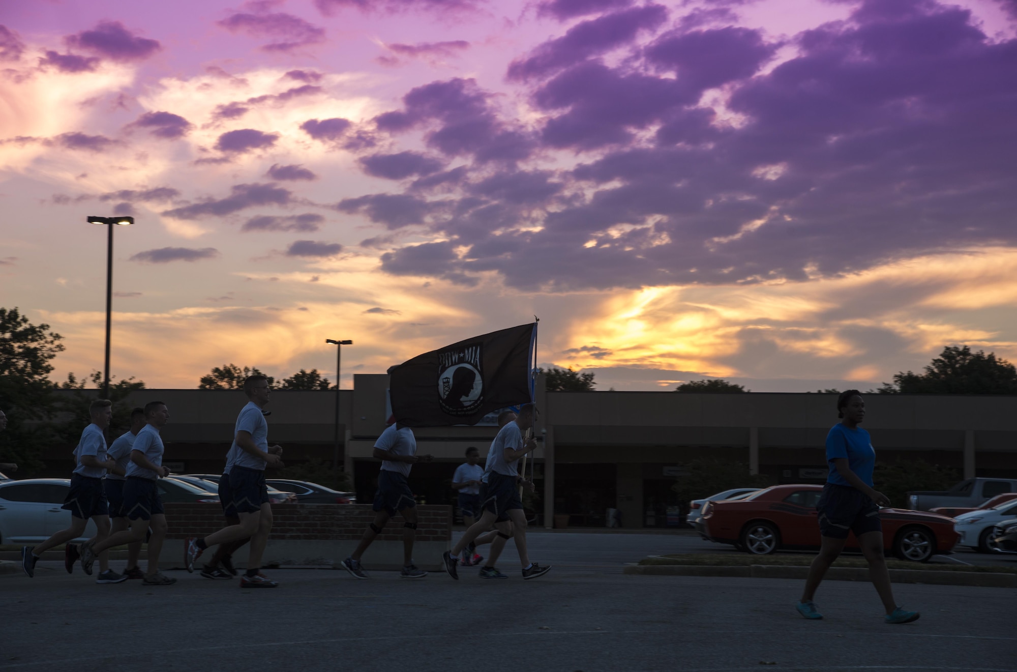 Airmen run together at Joint Base Andrews, Md., during the POW/MIA Recognition Event, Sept. 16, 2016. The run lasted 24 hours and paid tribute to the service members both missing in action and taken as prisoners of war. (U.S. Air Force photo by Senior Airman Mariah Haddenham)
