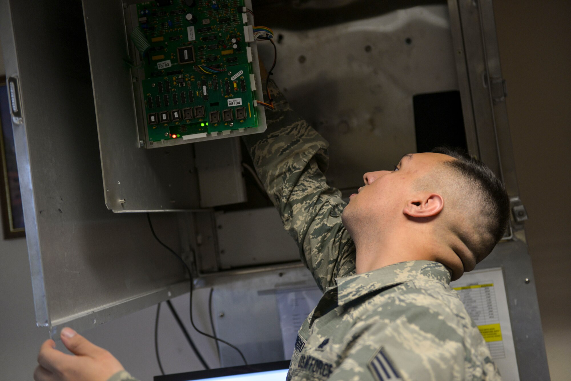 U.S. Air Force Senior Airman Michael Bielawski, a 354th Communications Squadron radio frequency transmissions journeyman, works on the Giant Voice system Sept. 13, 2016, at Eielson Air Force Base, Alaska. Radio frequency transmissions use this system for emergency communication as well as Reveille, Retreat, Taps and the National Anthem. (U.S. Air Force photo by Airman Isaac Johnson)