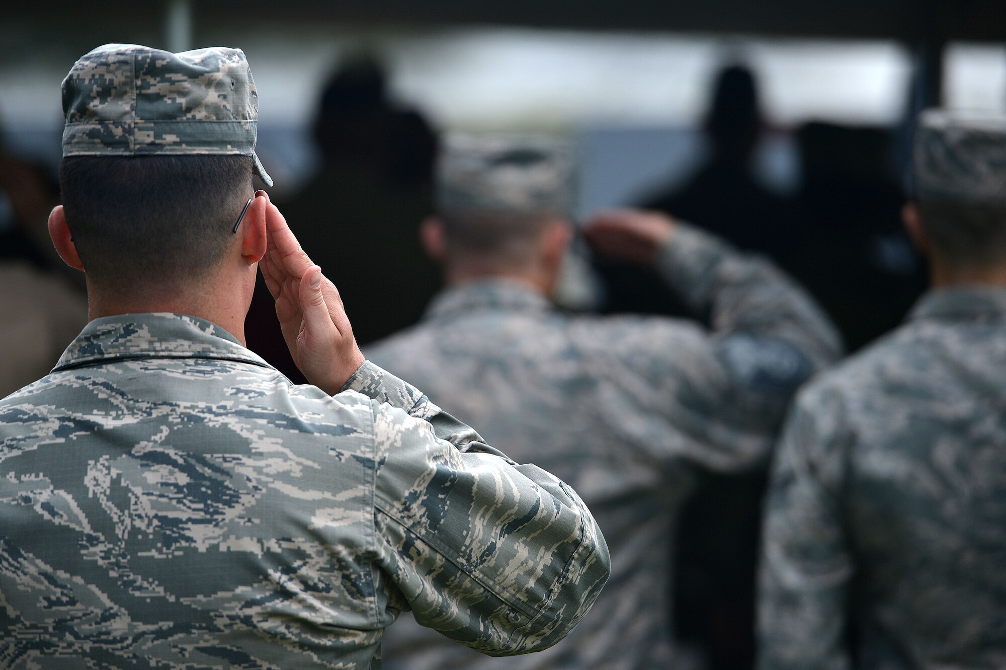 Team Shaw members salute during a National POW/MIA Recognition Day ceremony at Shaw Air Force Base, S.C., Sept. 16, 2016. Veterans and local community leaders also attended the ceremony, which included the posting of the POW/MIA flag, a wreath laying, and a three-volley rifle salute. (U.S. Air Force photo by Airman 1st Class Christopher Maldonado)