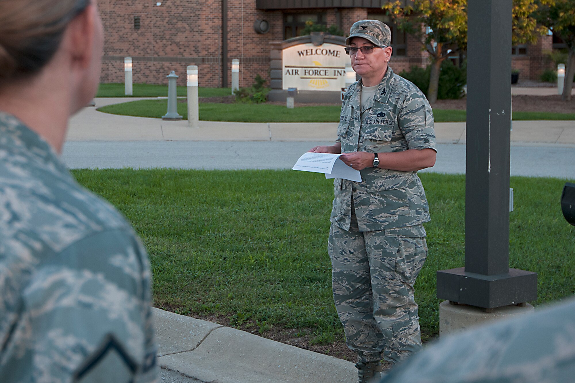 Col. Anna Schulte, 434th Maintenance Group commander, speaks about the importance of remembering the U.S. service members who have been captured or killed in the line of duty during a ceremony at Grissom Air Reserve Base, Ind. Sept. 12, 2016.  During the ceremony the POW/MIA. flag was raised with the American Flag in honor of the missing and captured. (U.S. Air Force photo/Staff Sgt. Dakota Bergl) 