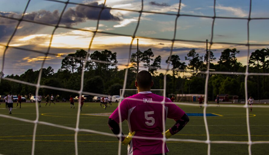 Nathan Wemhoff, a member of the 1st Special Operations Medical Group intramural soccer team, defends the goal against the 319th Special Operations Squadron during the 2016 Intramural Soccer Championship game at Hurlburt Field, Fla. Sept. 13 2016. The 1st SOMDG defeated the 319th SOS in a double-elimination match with a final score of 2-0. (U.S. Air Force photo by Airman 1st Class Isaac O. Guest IV)

