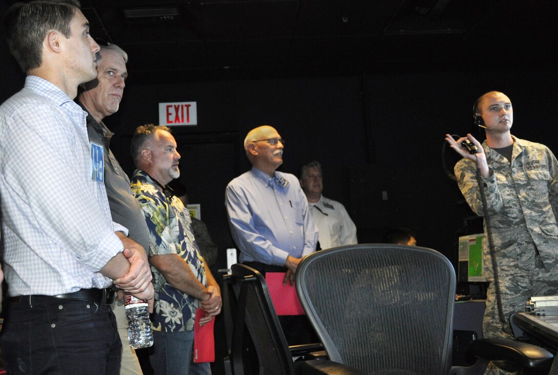 Travis Air Force Base Honorary Commanders got a look behind the scenes of the 60th Operations Group Sept. 9, 2016, on their Group Tour. (U.S. Air Force photos/Ellen Hatfield/released)
