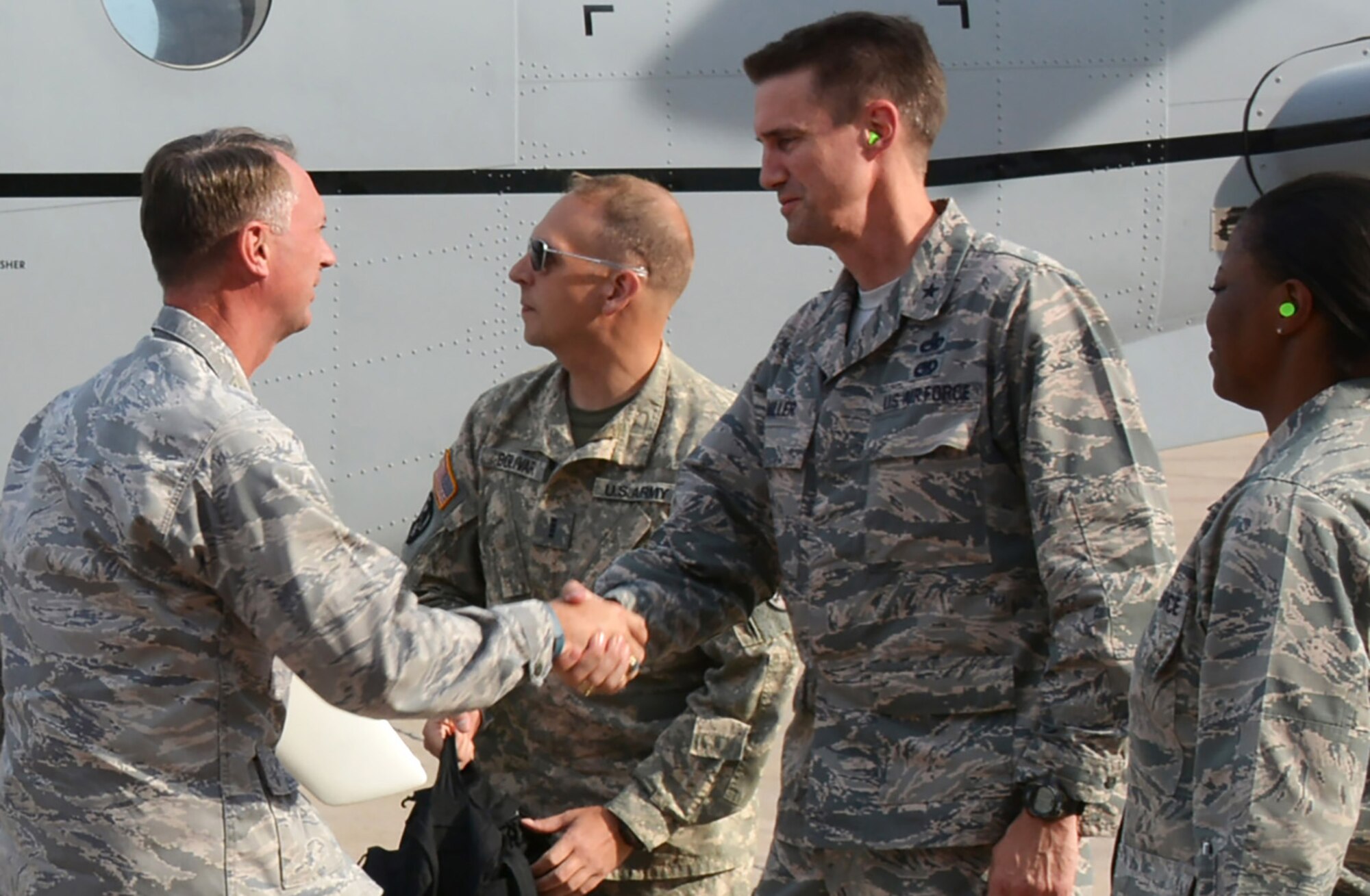 Maj. Gen. Warren D. Berry, Air Force Materiel Command vice commander, is welcomed by Tinker Air Force Base senior leaders upon his arrival to Tinker Air Force Base Sept. 12. General Berry was making his first full immersion visit to Tinker. During his two-day trip, General Berry received a holistic immersion of the Air Force Sustainment Center, to include the 72nd Air Base Wing, the Oklahoma City Air Logistics Complex and Life Cycle Management Center offices currently housed in Bldg. 3001, headquarters to the AFSC and OC-ALC. Greeting General Berry are Brig. Gen. Tom Miller, AFSC vice commander, and Col. Stephanie Wilson, 72nd ABW commander. As vice commander of AFMC, which employs some 80,000 people and carries $60 billion of budget authority annually, General Berry oversees activities in six different centers responsible for installation and mission support, discovery and development, test and evaluation, life cycle management services and sustainment. (Air Force photo by Darren D. Heusel)