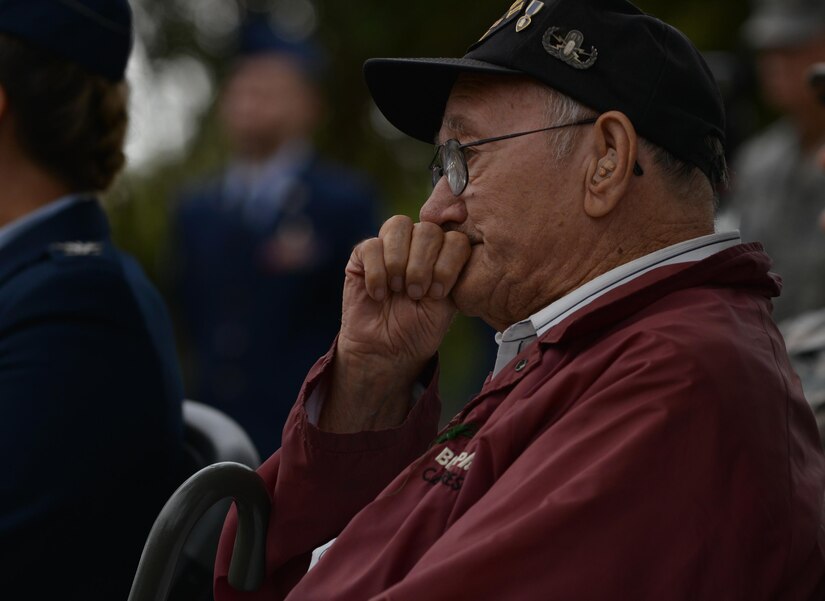 Allen Ordorff, a World War II veteran, listens as a fellow veteran shares his story of being captured as a prisoner of war during the Vietnam War at the POW/MIA Recognition Day ceremony at Joint Base Langley-Eustis, Va., Sept. 16, 2016. Orndorff volunteered to serve his country at the age of 17, and separated from the military at the rank of technical sergeant. (U.S. Air Force photo by Staff Sgt. Natasha Stannard)