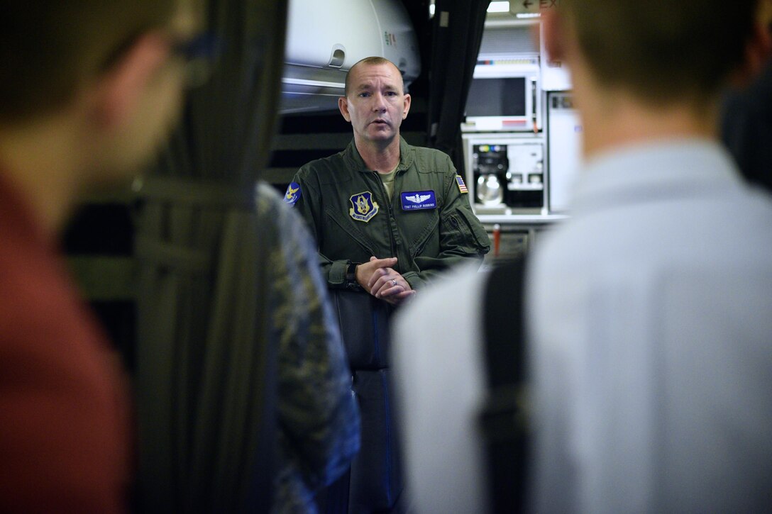 Tech. Sgt. Phillip Robbins, flight attendant with the 73rd Airlift Squadron speaks with Air Force ROTC cadets from the University of Louisville, Kentucky, Detachment 295, during a visit to Scott Air Force Base, Sep. 16, 2016. The cadets toured a C-40C and a C-21 as well as spoke with pilots, flight attendants and maintenance technicians who answered questions and shared information about Scott AFB and their Air Force careers. (U.S. Air Force photo by Christopher Parr)