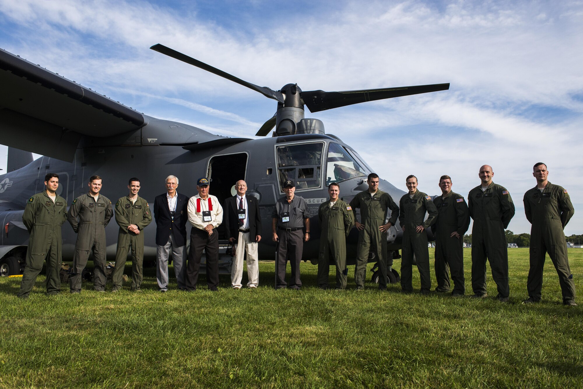 Current members of the 20th Special Operations Squadron at Cannon Air Force Base, N.M., stand with veterans of the 20th SOS in front of a CV-22 Osprey aircraft before the start of the Green Hornet Dedication ceremony at the National Museum of the United States Air Force near Wright-Patterson Air Force Base, Ohio, Sept. 15, 2016. The Osprey crew travelled from Cannon to honor the heritage of the 20th SOS with a landing, fly over and public display with the aircraft. (U.S. Air Force photo by Senior Airman Luke Kitterman/Released)