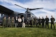 Current members of the 20th Special Operations Squadron at Cannon Air Force Base, N.M., stand with veterans of the 20th SOS in front of a CV-22 Osprey aircraft before the start of the Green Hornet Dedication ceremony at the National Museum of the United States Air Force near Wright-Patterson Air Force Base, Ohio, Sept. 15, 2016. The Osprey crew travelled from Cannon to honor the heritage of the 20th SOS with a landing, fly over and public display with the aircraft. (U.S. Air Force photo by Senior Airman Luke Kitterman/Released)
