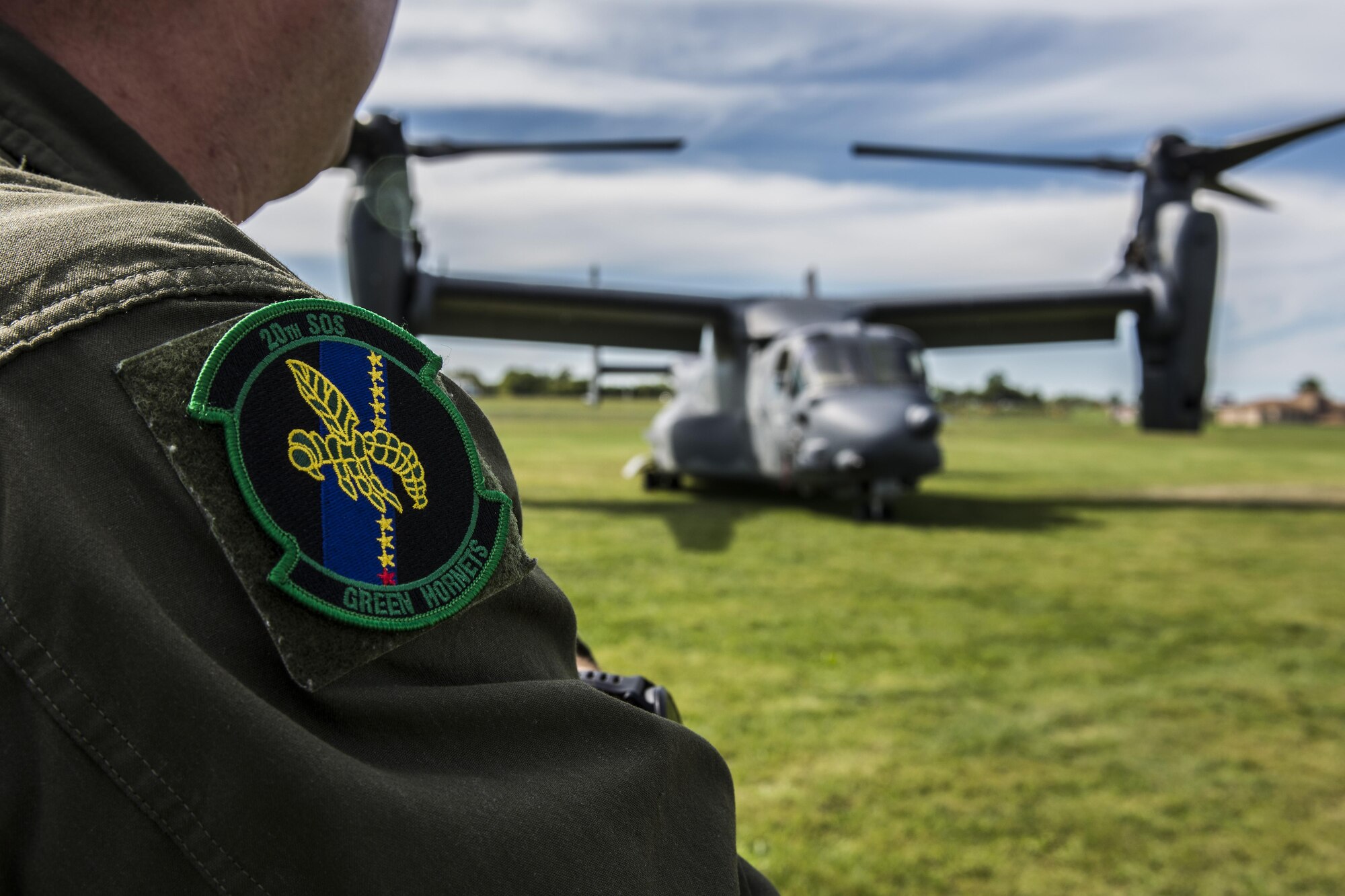 The 20th Special Operations Squadron patch is displayed on the arm of an Airman after the Green Hornet Dedication ceremony at the National Museum of the United States Air Force near Wright-Patterson Air Force Base, Ohio, Sept. 15, 2016. Current 20th SOS members were able to meet veterans of the same squadron and share their experiences. (U.S. Air Force photo by Senior Airman Luke Kitterman/Released)